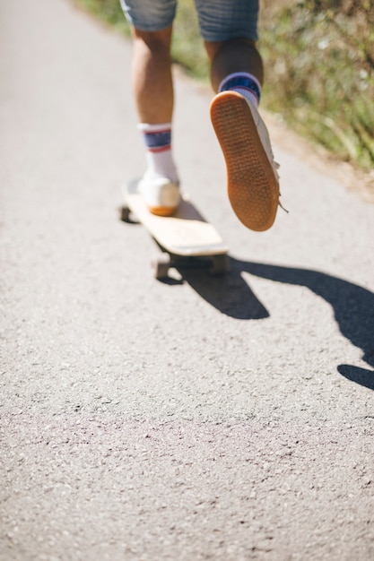 Back view of guy skateboarding