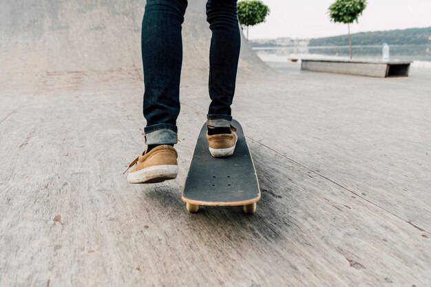 Back view of man skateboarding