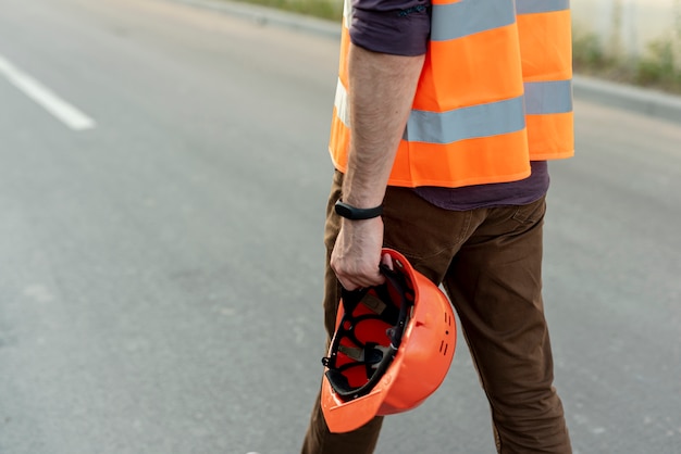 Free Photo back view of man with protection helmet