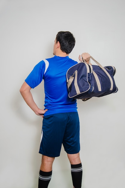 Free Photo back view of man with sports bag