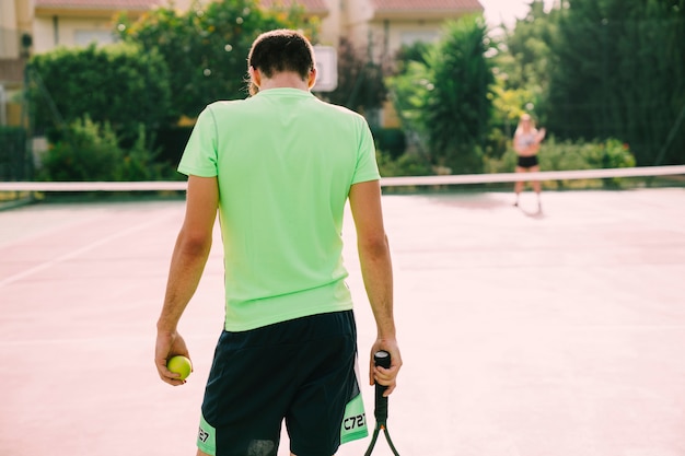 Back view of tennis player