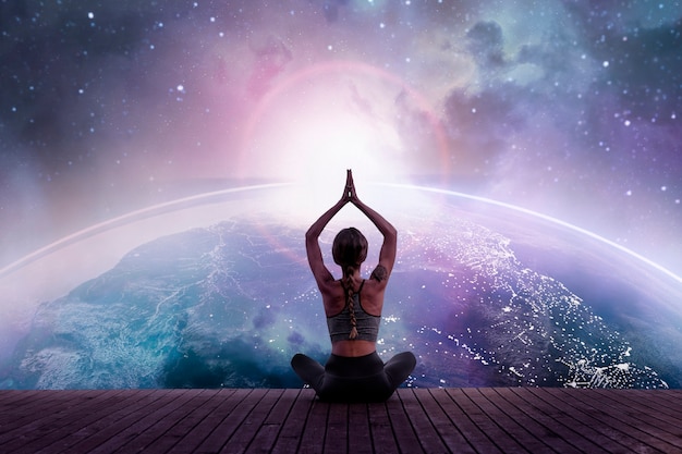 Back view woman meditating in space