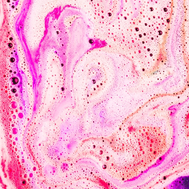 Free Photo backdrop of dissolve bathbomb in water