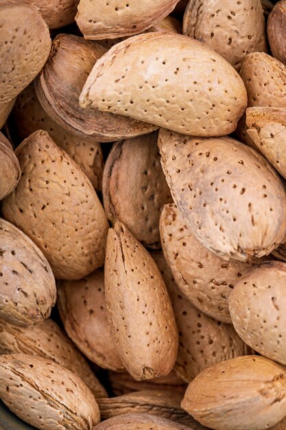 Background of almonds in shell close up view