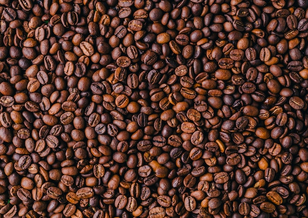 Free photo background of roasted fresh brown coffee beans - perfect for a cool wallpaper