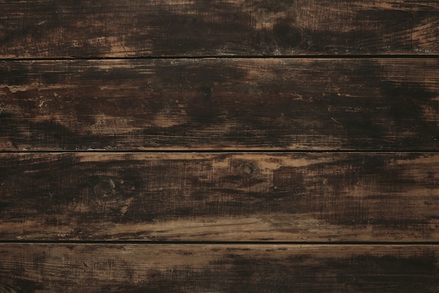 Free photo background, top view of old vintage aged brushed brown wooden table, rich texture