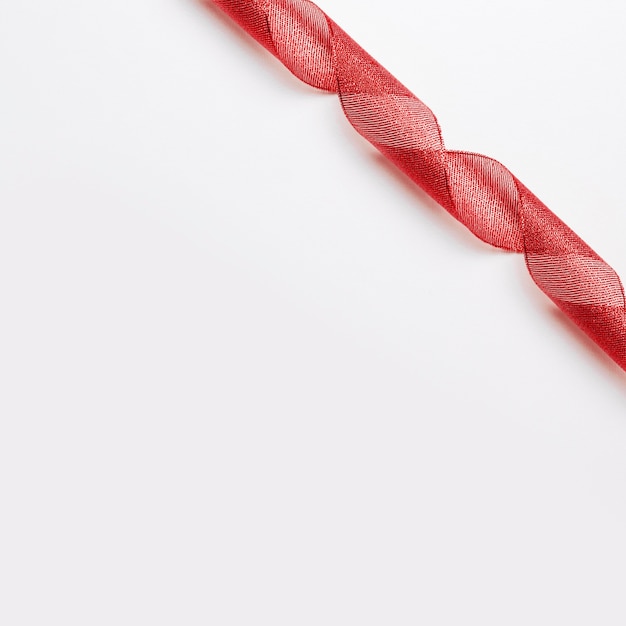 Free Photo background of twisted red ribbon