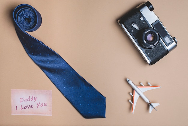 Free photo background with necktie, plane and camera for father's day