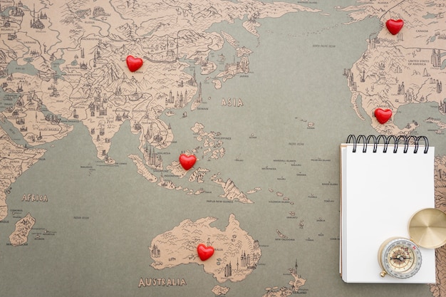 Free photo background with retro world map, compass and notebook