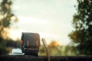 Free photo backpack with sunset