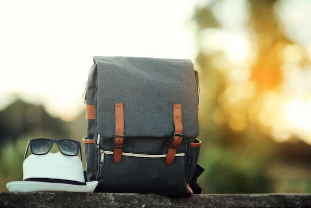 Free photo backpack with sunset