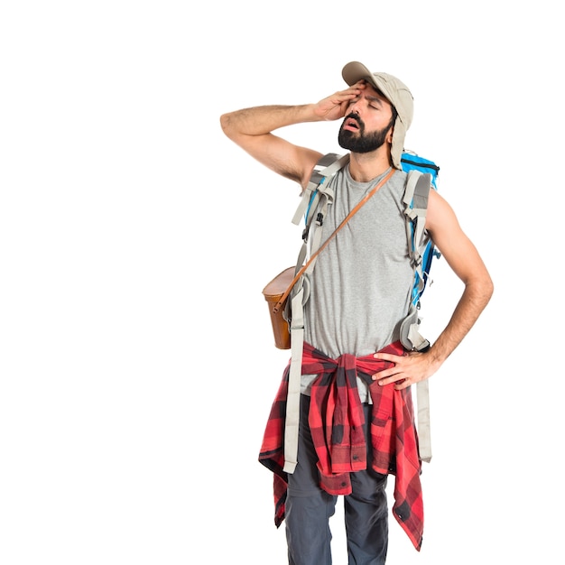 Free photo backpacker thinking over isolated white background