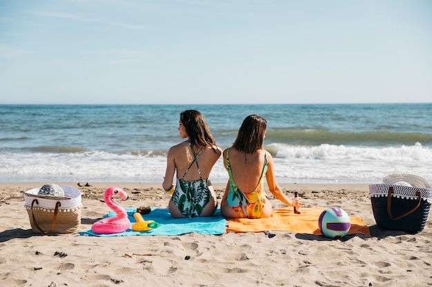 Backview of girls at the beach