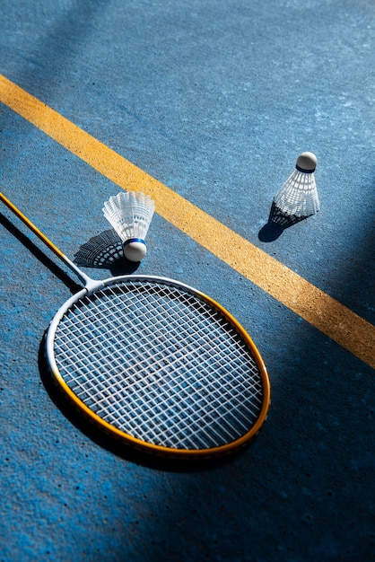 Badminton concept with racket and shuttlecock