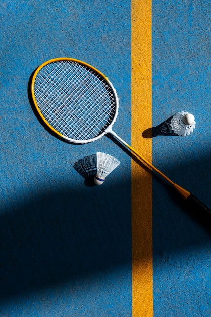 Badminton concept with racket and shuttlecock