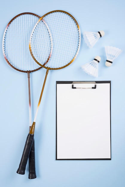 Free Photo badminton equipment with clipboard composition