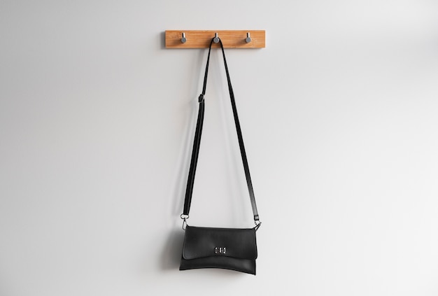 Free photo bag hanging from furniture item indoors