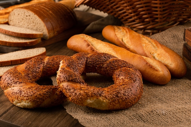 Bagels with baguette and slices of bread