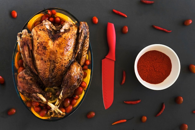 Free photo baked chicken in glassware on grey table