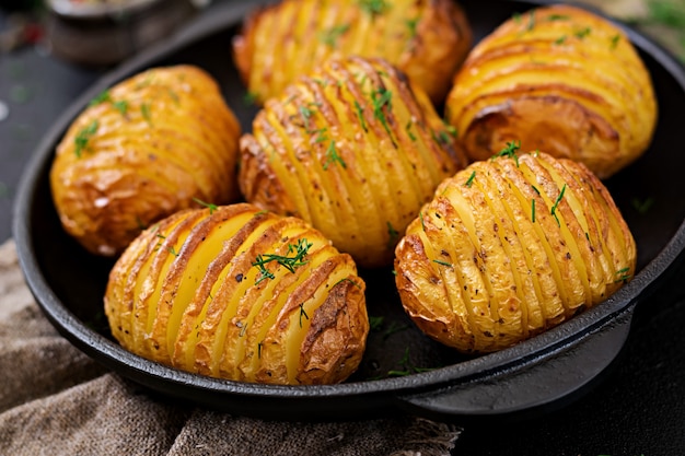 Baked potato with herbs. Vegan food. Healthy meal.