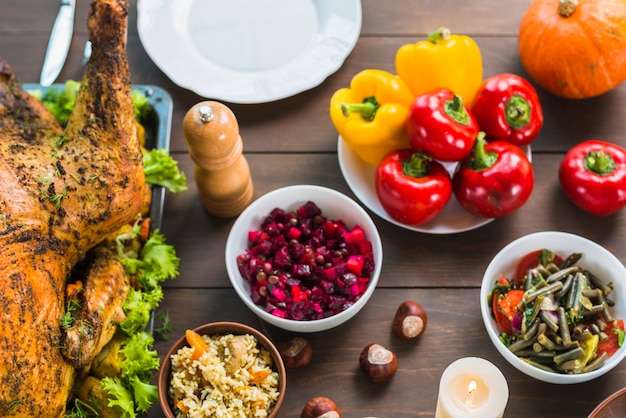 Free Photo baked turkey with salads in bowls 