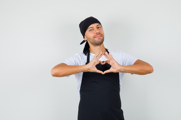 Baker man showing heart gesture in t-shirt