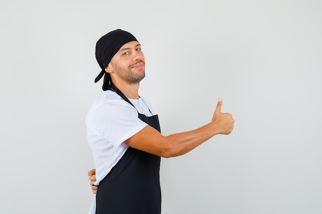 Baker man showing thumb up in t-shirt