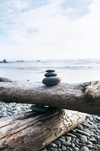 Free photo balanced rocks at the beach zen and nature photography