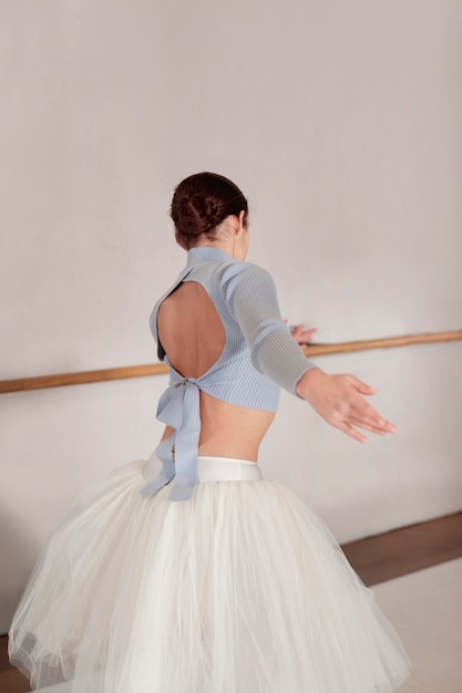 Ballerina rehearsing in tutu skirt