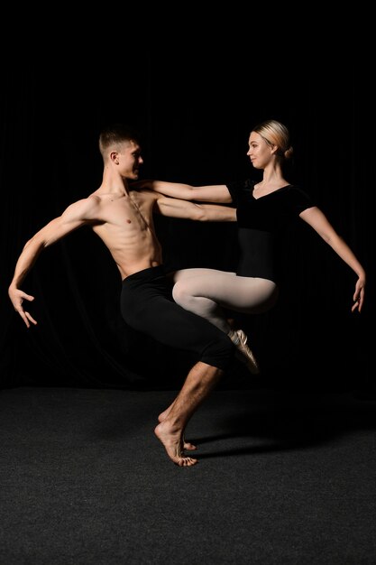 Ballet dancers posing in ballet position