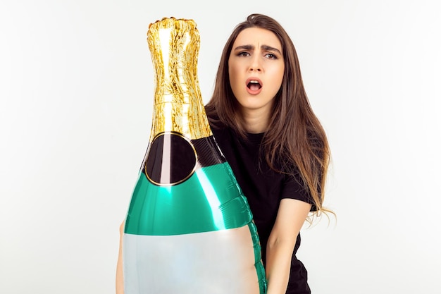 Balloon champagne bottle young girl holding balloon