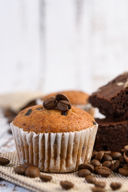 Banana cupcakes mixed with chocolate chip on a white plate.