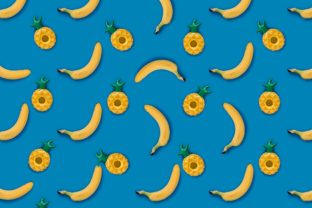 Free photo banana pattern with pineapple