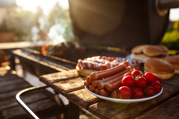 Free photo barbecue grill party. tasty food on wooden desk.