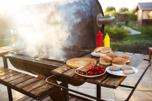 Free photo barbecue grill party. tasty food on wooden desk.