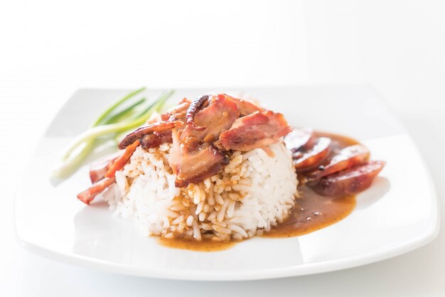 Barbecued red pork in sauce with rice