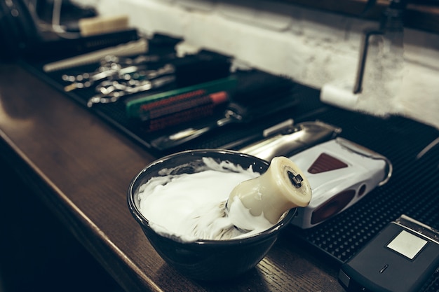 Free Photo barber shop tools on the table. close up view shaving foam.