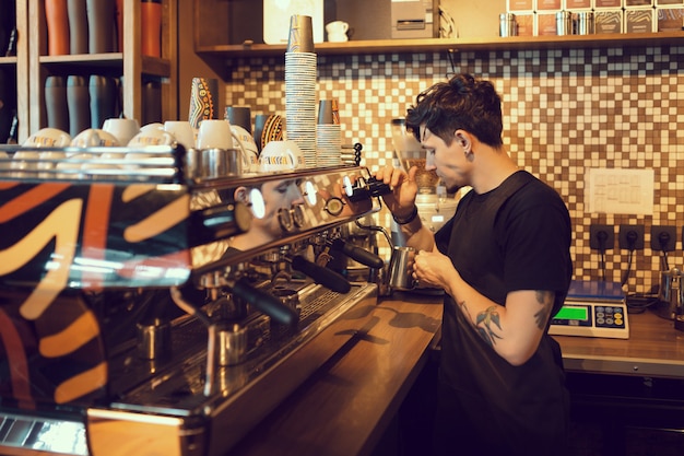 Barista at work in a coffee shop