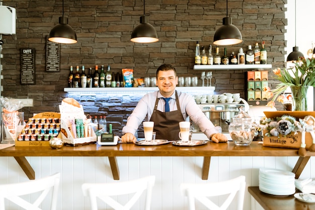 Free Photo barman behind bar