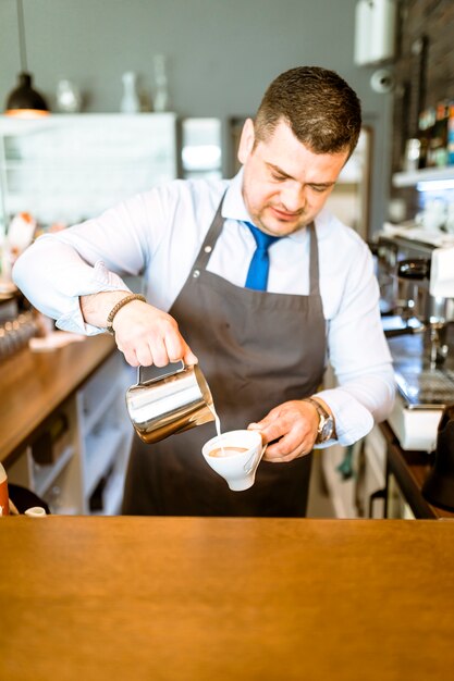 Barman making coffee