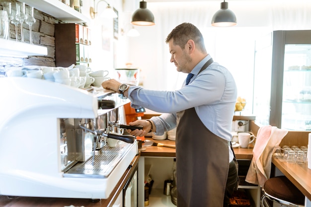 Barman making coffee