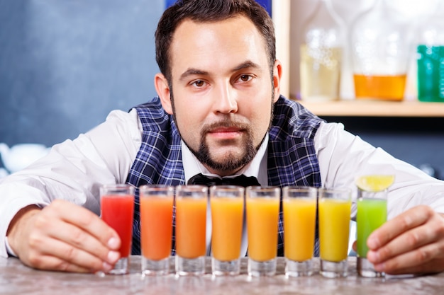 Free Photo barman at work, preparing cocktails.