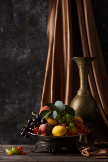 Free Photo baroque style with fruits and vase