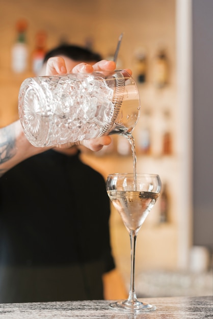 Bartender preparing a refreshing cocktail