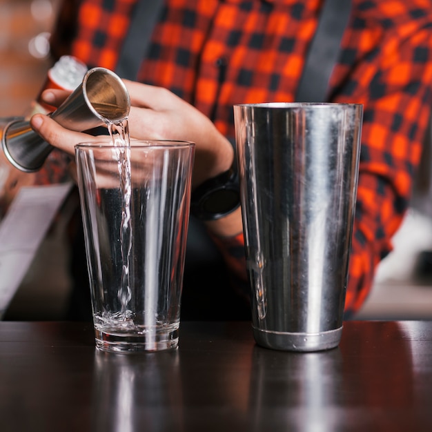 Bartender preparing a refreshing cocktail