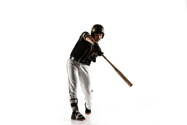 Baseball player, pitcher in a black uniform practicing and training isolated on a white background.