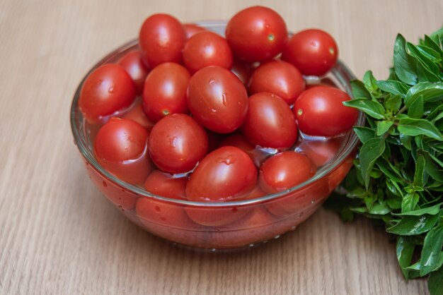 Basil and tomato on the table