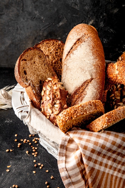 Basket of breads on black surface