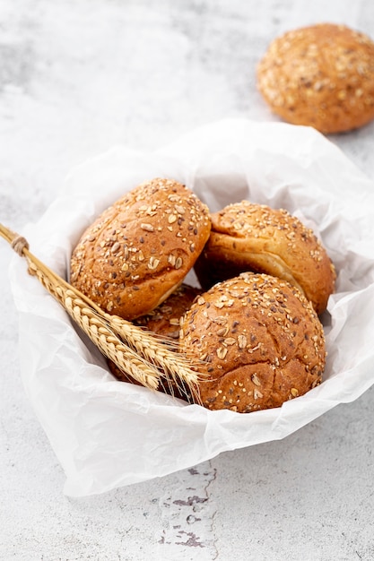 Basket with napkin full of baked buns