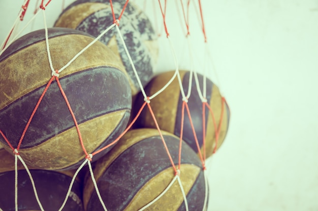 Free photo basketball balls in a net